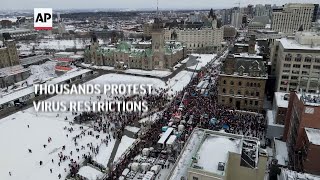 Thousands protest pandemic restrictions in Ottawa [upl. by Sices]