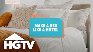 How to House How to Make a Bed Like a Hotel  HGTV [upl. by Nihi652]