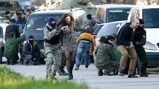 Russian forces storm Ukraines Crimea bases [upl. by Aihtekal]