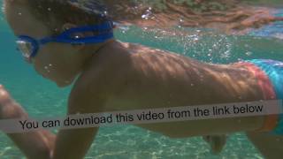 Little Boy Swimming Underwater in the Sea [upl. by Codie]