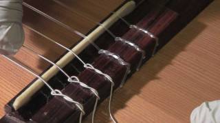 How to restring a classical guitar [upl. by Ahsihat]